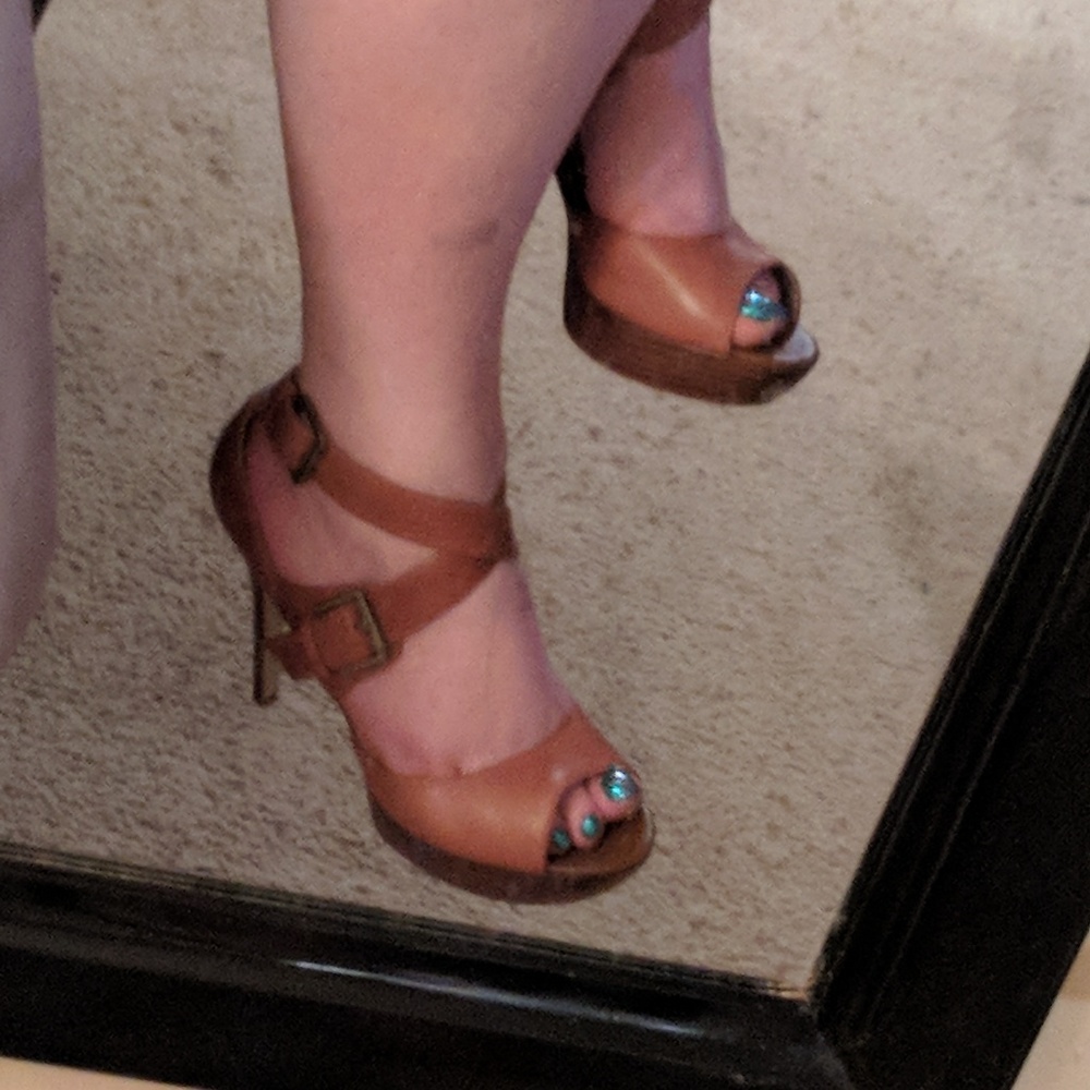 Strappy, buckel accent high heeled sandals